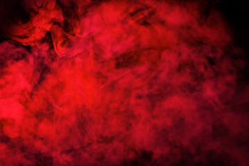 Red smoke texture on black background. Texture