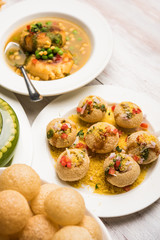 group of Bombay chat food includes golgappa/panipuri, bhel-puri, sev-poori, dahipuri, Ragda pattice, raj kachori etc. selective focus