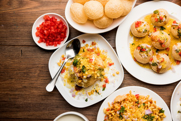 group of Bombay chat food includes golgappa/panipuri, bhel-puri, sev-poori, dahipuri, Ragda pattice, raj kachori etc. selective focus