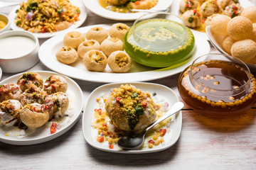 group of Bombay chat food includes golgappa/panipuri, bhel-puri, sev-poori, dahipuri, Ragda pattice, raj kachori etc. selective focus