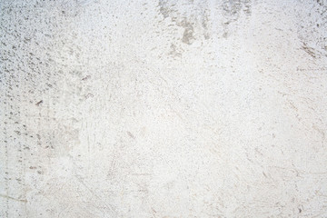 Grungy white concrete wall background. Texture of old gray concrete wall for background