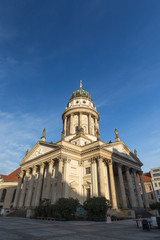Fototapeta na wymiar Beautiful view of the Französischer Dom (French Cathedral) at the Gendarmenmarkt Square in Berlin, Germany, on a sunny morning. Copy space.