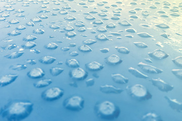 Blue wall after rain condensation walls. A drop of water on the wall 
