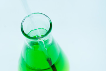 Syringe containing the chemicals contained within the Erlenmeyer flask, chemical and packaging....