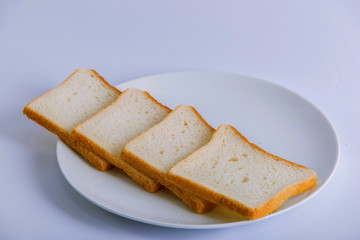 Closeup bread milk glass in a plate