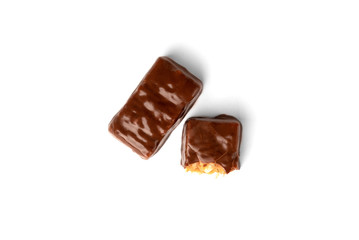 Chocolate sweet with caramel and peanut isolated on white background.