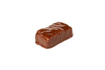 Chocolate sweet with caramel and peanut isolated on white background.
