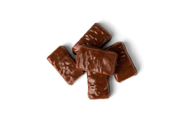 Chocolate sweet with caramel and peanut isolated on white background.