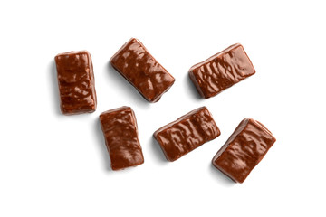 Chocolate sweet with caramel and peanut isolated on white background.