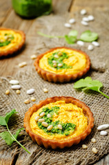 buckwheat tartlets with with white beans carrot hummus and cilantro pesto