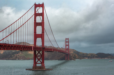 Golden gate bridge in San Francisco in storming clouds, California, USA 