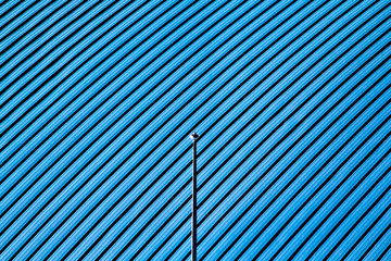 Obraz premium Abstract Geometric Architecture. Blue Roof with Angled Lines.