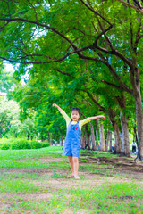 Portrait of asian adorable girl recreation in city park