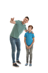 Fototapeta premium Portrait of dad and his son isolated on white