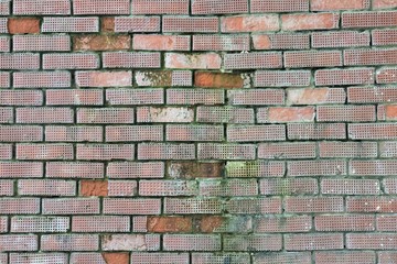 Collapsing brick wall of an old house