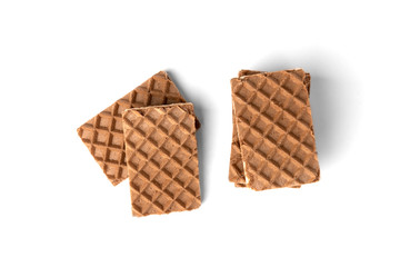 Chocolate waffles with milk filling isolated on white background.
