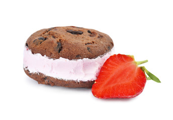 Sweet delicious ice cream cookie sandwich and strawberry on white background