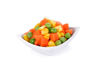 Mix of vegetable containing carrots, peas, and corn on white background