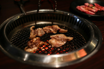 japanese food meat on fire