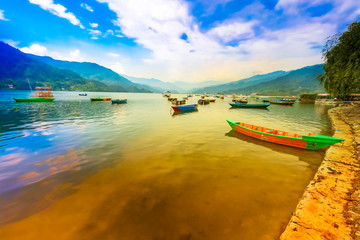 Nepal Boats Main Attraction of phewa Lake on Background sunset.