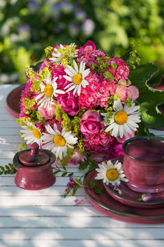 Summer flower arrangement with pink roses