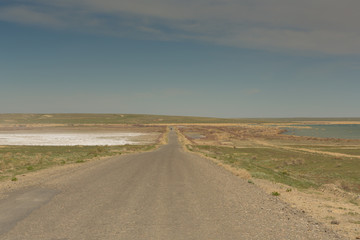 Fototapeta na wymiar The road through the steppes to the Aral sea.Kazakhstan,2019