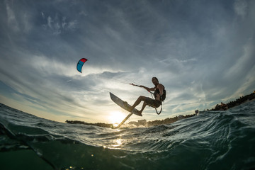 Surf rides Hydrofoilkite  - obrazy, fototapety, plakaty