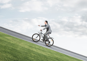 Fototapeta premium Businessman with paper documents in hand