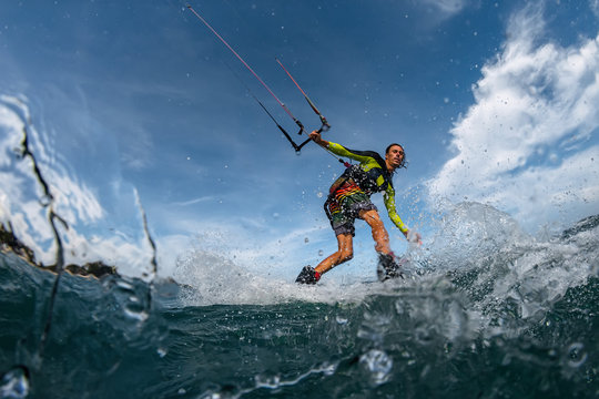 Kite surfer on the waves © Oleg