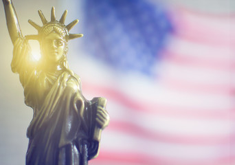 Fototapeta na wymiar Statue of Liberty with the light behind