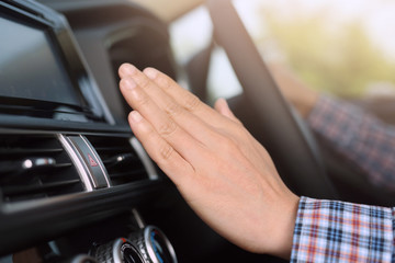 Men pressing hands on the remote control car alarm system Car theft alarm concept