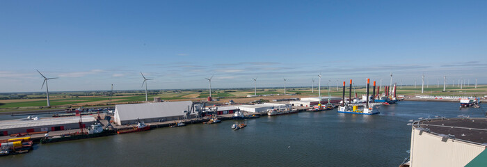 Windmills in Eemsmond. Delfzijl. Netherlands. Green energy. Waddenzee coast, Harbour