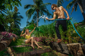 Couple having fun  in garden