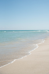 Fototapeta na wymiar SHORELINE AT A BEACH