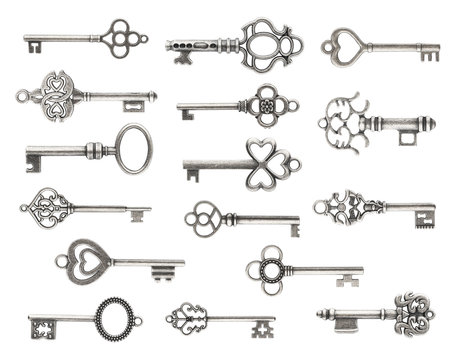 Set of vintage silver skeleton keys isolated on white background