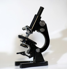 This is an old microscope in good condition and working