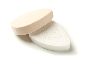 Bath sponges isolated on white background, closeup