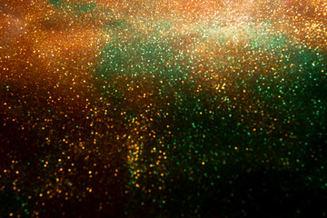Fototapeta na wymiar Glitter vintage lights background.Abstract Gold. Glitter wonderful lights background.