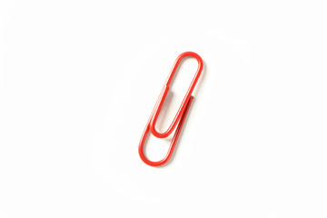 Color paper clip isolated on white background, closeup