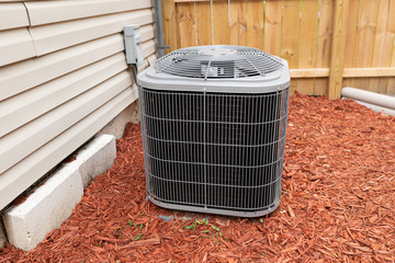 air conditioner has been properly installed and is cooling on a hot day