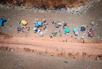 Garbage pile in trash dump or landfill, Aerial view garbage trucks unload garbage to a landfill..