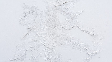 White old weathered painted wall of cement background texture