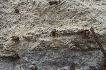 The concrete texture, wall, with cracks and scratches can be used as a background, web banner with space for text