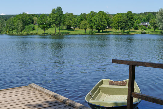 bathing lake with a boat: Kell am See in rhienland Palatinate ( Rheinland-Pfalz), Germanys