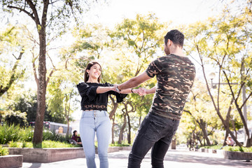 Couple in love. Enjoying happy in public park