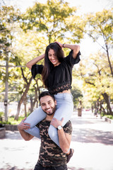 Couple in love. Enjoying happy in public park