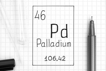 The Periodic table of elements. Handwriting chemical element Palladium Pd with black pen, test tube and pipette.