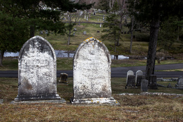 Two old gravestones with Mother and Father on them