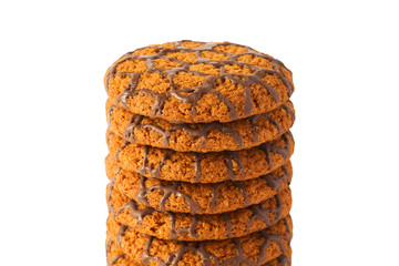 Lots of chocolate cookies isolated on white background.