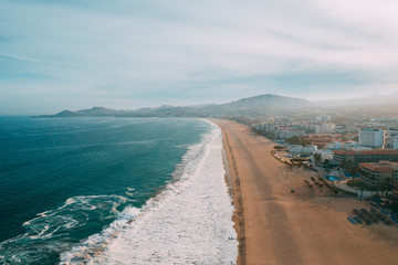 aerial view of waves and beach